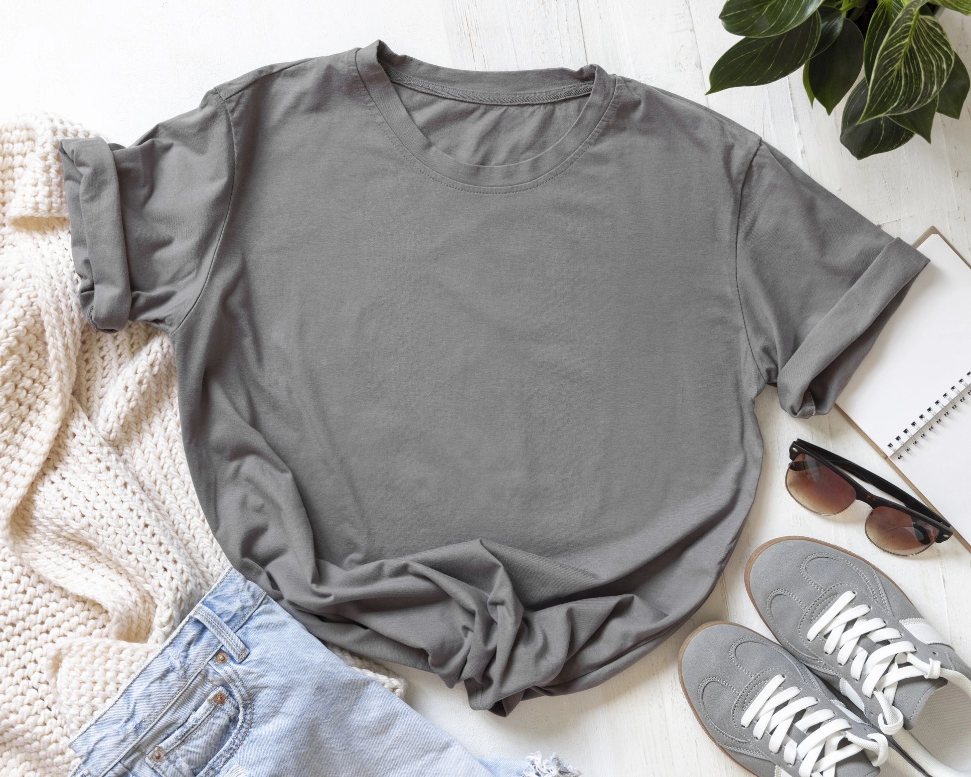 Charcoal t-shirt flat lay with accessories