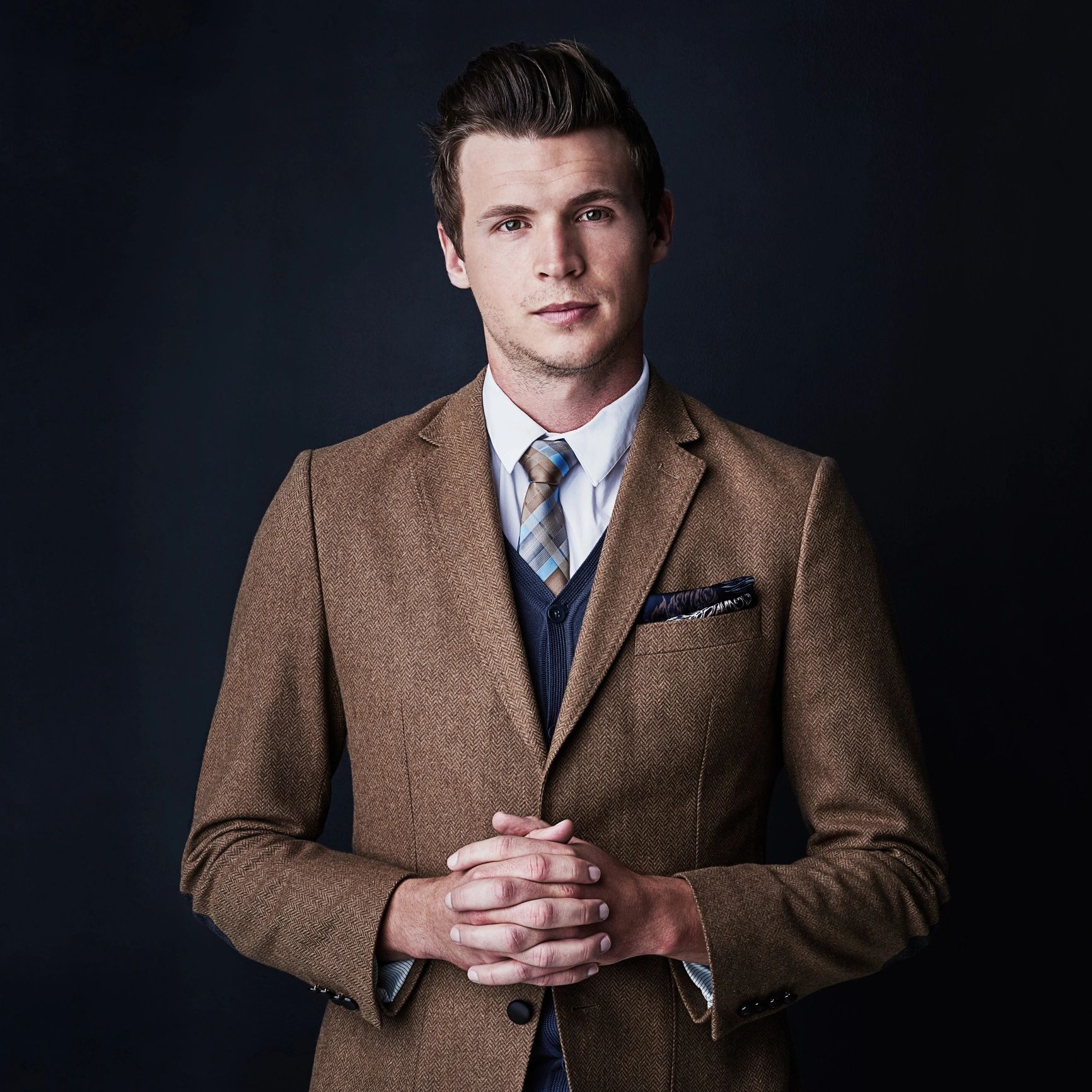 Portrait of a professional on a dark background